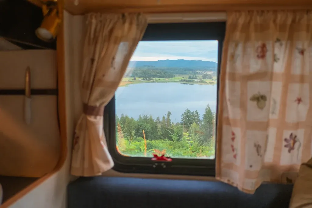 Lake view through a cabin window